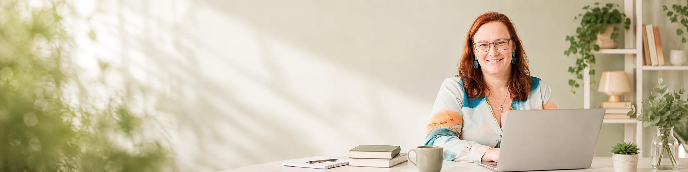 A research support conversation at a desk